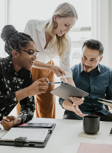 3-People-Looking-at-Tablet